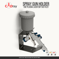 Wall-mounted metal spray gun holder supporting an HVLP paint gun