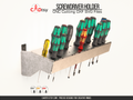 Metal screwdriver rack loaded with assorted hand screwdrivers