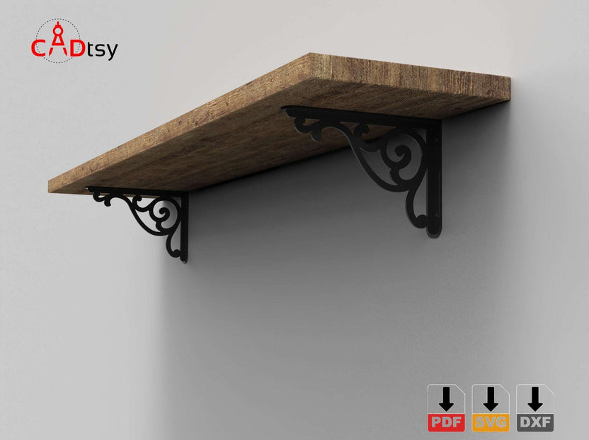 A pair of decorative metal shelf brackets, made from a DXF file, shown mounted on a wall, ready to support a shelf.