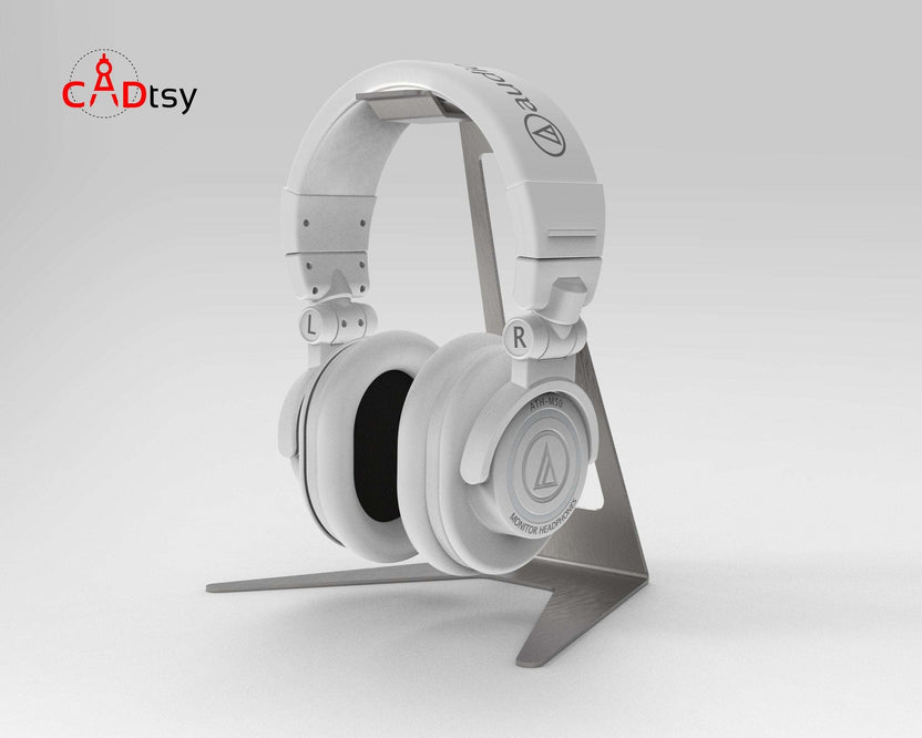 White headphones displayed on metal stand, left angle