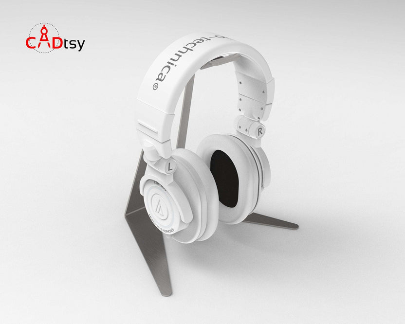 White headphones on black metal stand, right angle