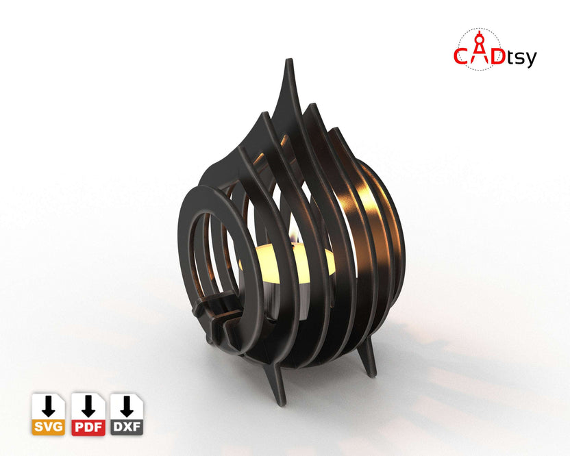 Lit black metal tea light holder casting warm light
