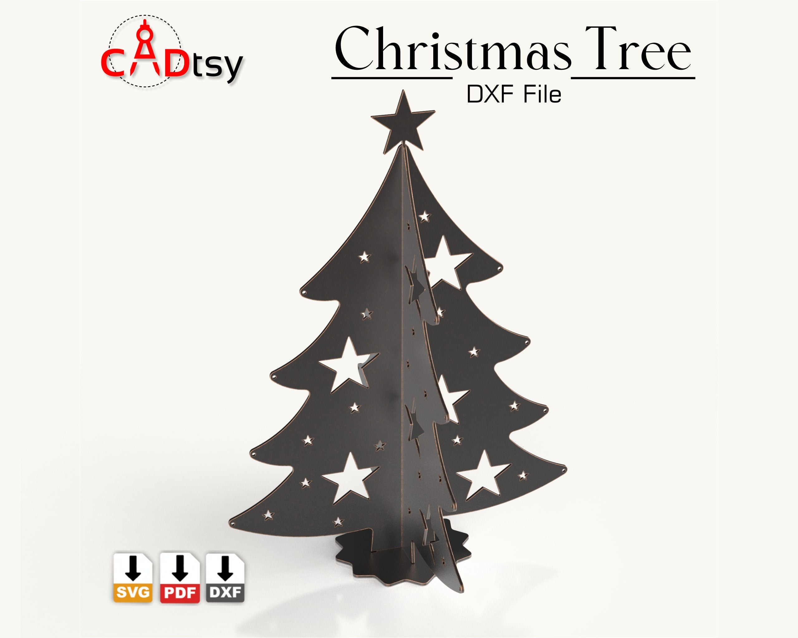 A 3D metal Christmas tree decoration, made from a DXF file, sitting on a table with festive lights in the background.